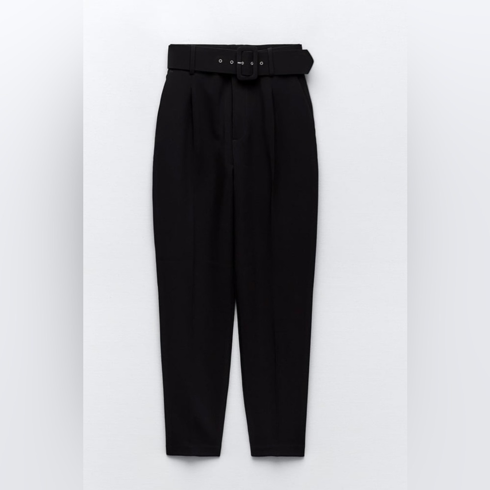 Black High rise ankle pants with darts and tonal lined belt.